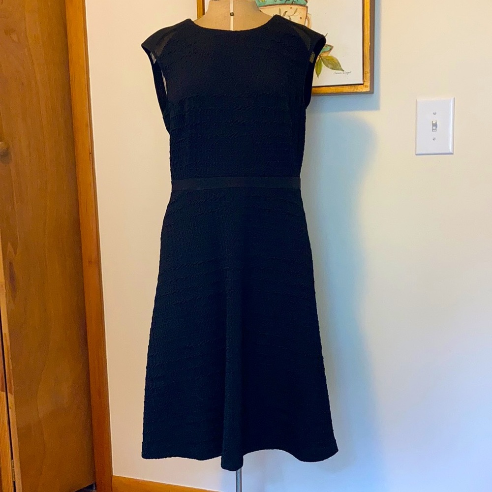 Black textured Calvin Klein dress.